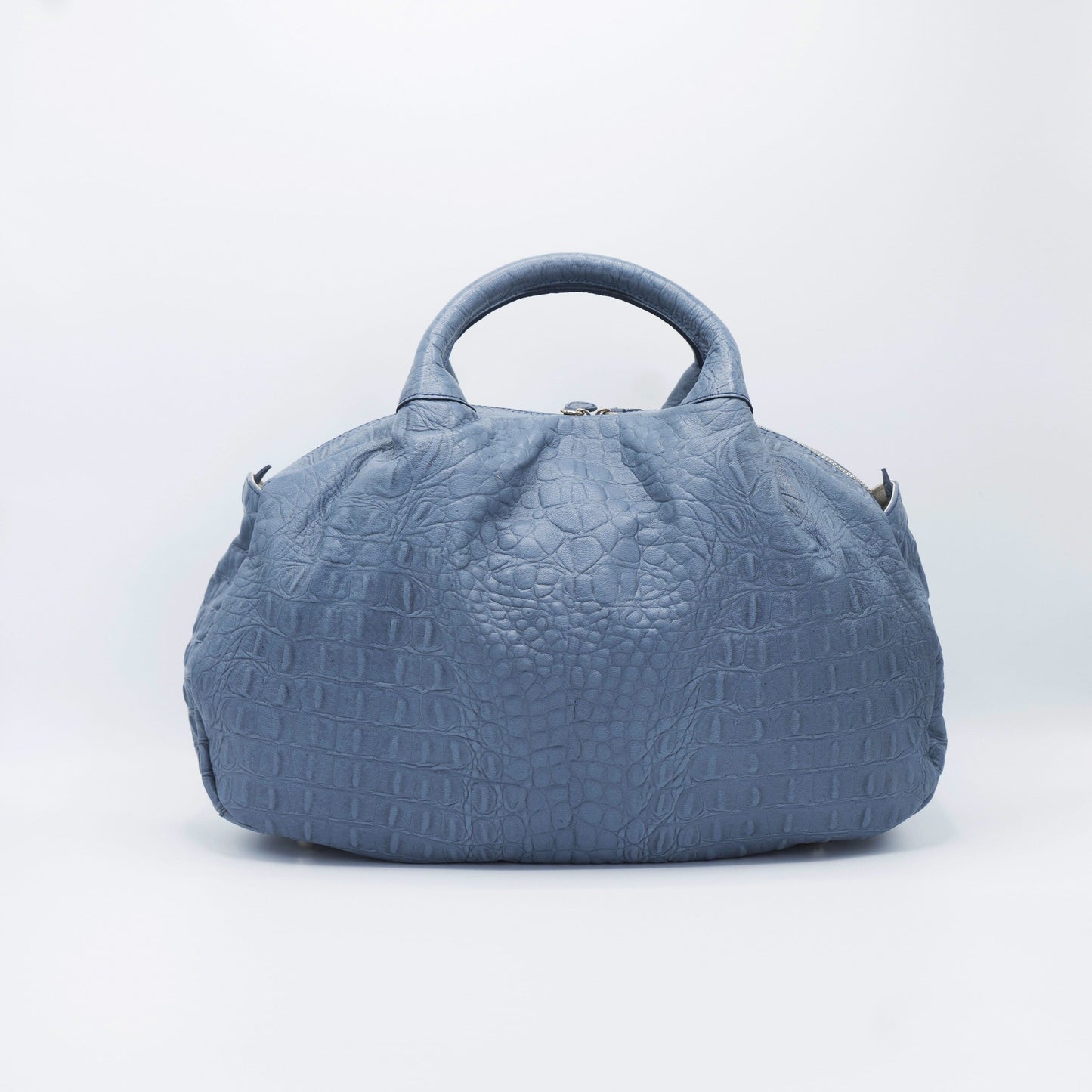 Gray sustainably sourced, crocodile embossed Turkish leather. This medium-sized handbag, tote, and messenger is expertly crafted to our exacting standards. 